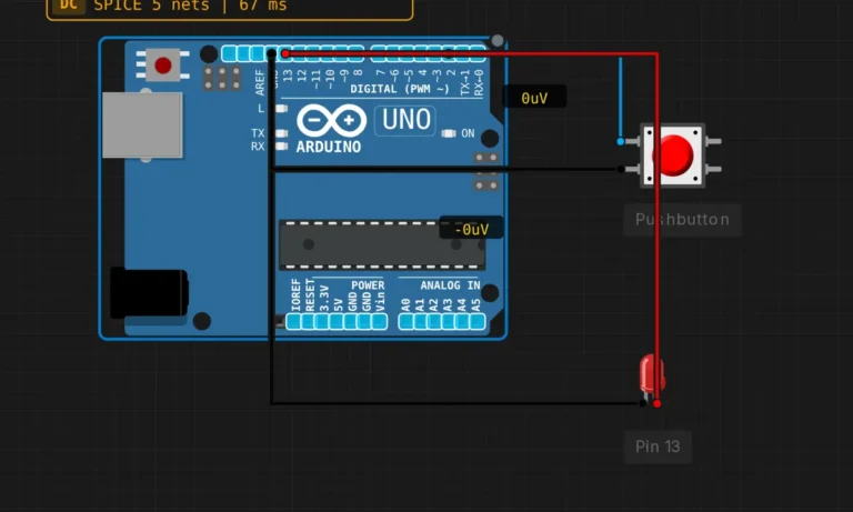 Arduino Uno with a pushbutton on pin 2 and a red LED on pin 13, wired in a browser simulator