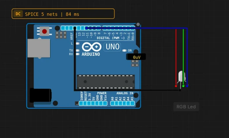 Arduino Uno wired to a common-cathode RGB LED on PWM pins 9, 10 and 11 in a circuit simulator