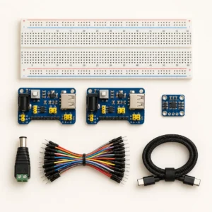 Breadboard Power Studio kit contents: 830-point breadboard, dual power supply modules, current sensor breakout and jumper wires