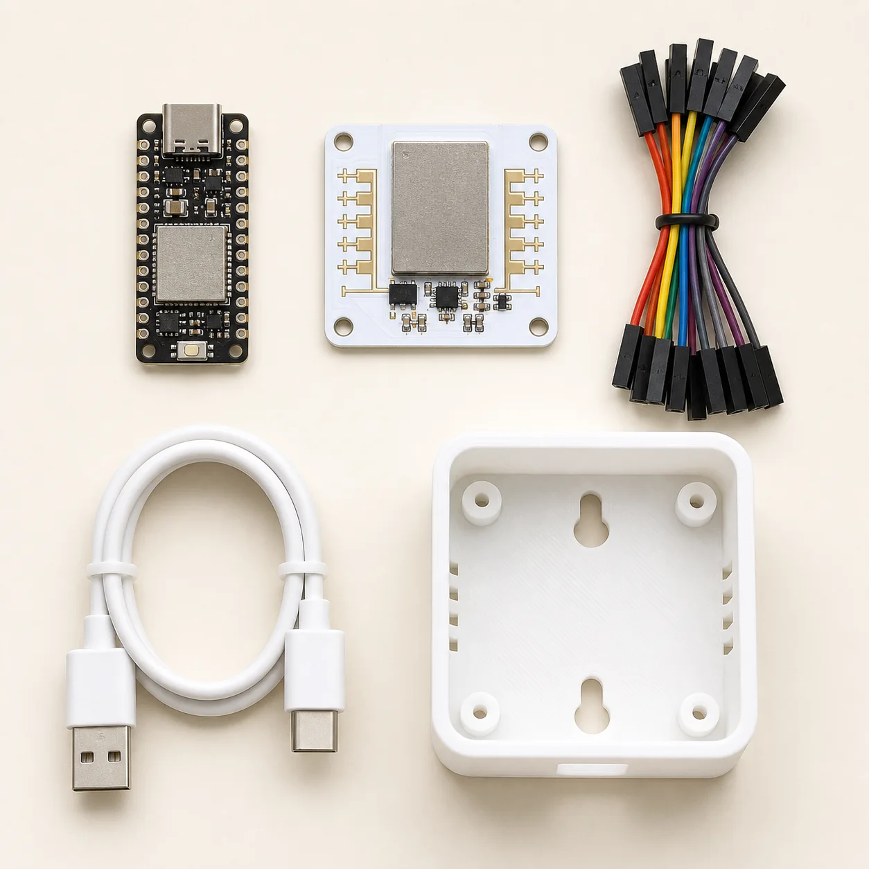 ESP32 mmWave presence sensor kit contents: ESP32-C3 board, 24GHz radar module, jumper wires and wall-mount enclosure