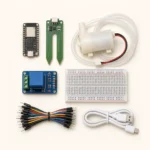 ESP32 plant watering kit contents flat lay: ESP32-C3 board, capacitive soil moisture sensor, 5V water pump, relay module, breadboard, jumper wires and USB-C cable